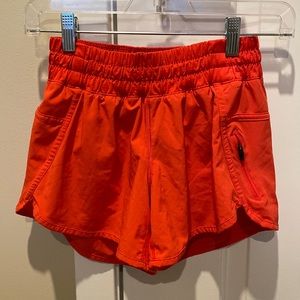 lululemon orange running shorts, size 4